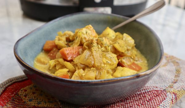 Crock pot med lax och torsk i saffran